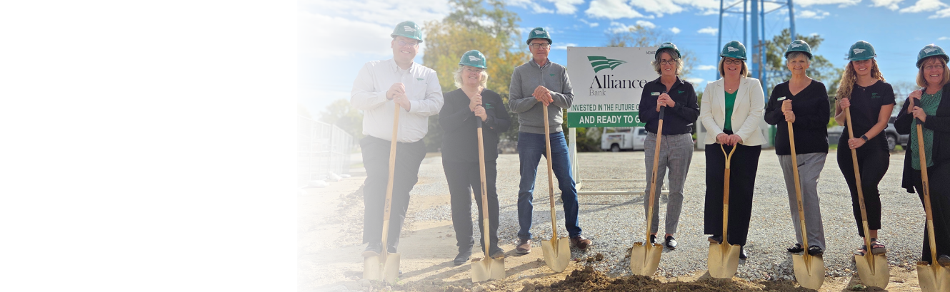 Picture of Alliance Bank officers breaking ground for the new Oxford office.